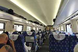 Category Historic EN Prints: Interior view of a passenger coach of the express train of the Laos-China Railway LCR