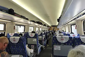 Category Historic EN Prints: Interior view of a passenger coach of the express train of the Laos-China Railway LCR