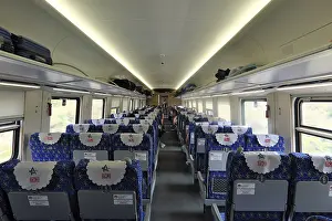 Category Historic EN Prints: Interior view of a passenger coach of the express train of the Laos-China Railway LCR
