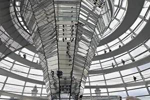 Interior view of the spiral walkway of the glass dome of the Reichstag building in Berlin