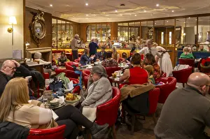 Interior White Hart Hotel, people sitting Colonnade bar and cocktail lounge