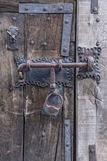 Iron forged padlock with lock, old castle gate of the medieval Herzberg castle
