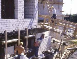 Iserlohn. Construction worker at a building project on 6