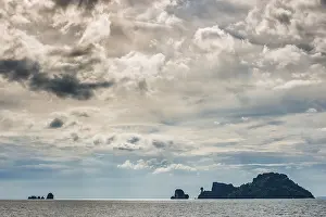 Island landscape with dramatic thunderstorm sky
