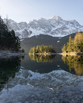 Category Mountain Landscapes Prints: Island in front of mountains, golden light