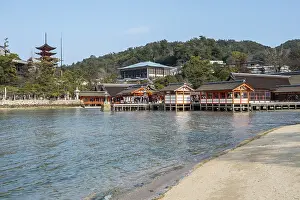 Itsukushima Shrine on stilts by the water on Miyajima