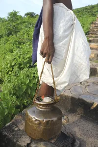 Jain Pujari at Buddhist site, Rajgir, Bihar, India