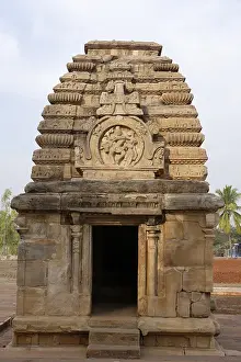 Jambulinga Temple tower curving ribs decorated horseshoe shaped large panel of Shiva dancing with Nandi and Parvati