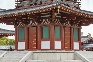 Japanese temple with red and green ornaments
