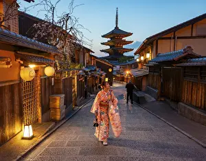 Japanese woman in kimono in an alley