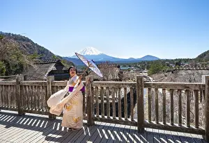 Japanese woman in kimono with umbrella