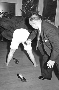 Jealousy, husband spanking wife's butt