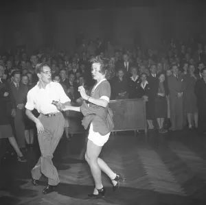 Jitterbug dance. A dance popularized in the United states and spread by American soldiers