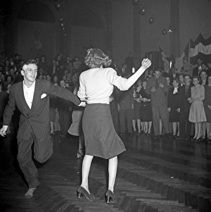 Jitterbug dance. A dance popularized in the United states and spread by American soldiers