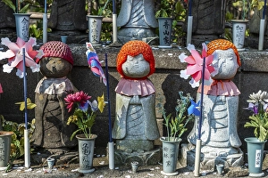 Jizo statues with red caps, protective deities for deceased children