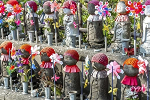 Jizo statues with red caps, protective deities for deceased children