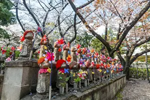 Jizo statues with red caps, protective deities for deceased children