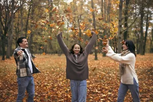 A joyful family playing in a park