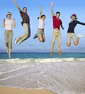 Category Historic EN Prints: Jumping young people happy group vacation tropical beach