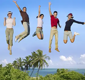 Category Historic EN Prints: Jumping young people happy group vacation tropical beach