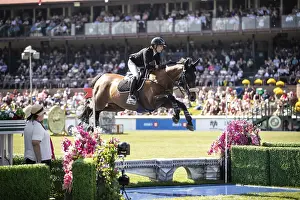 Category Historic EN Prints: Katie Laurie of Australia and riding Django II compete in the first round of the 1