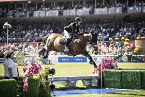 Category Historic EN Prints: Katie Laurie of Australia and riding Django II compete in the first round of the 1