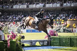 Category Historic EN Prints: Katie Laurie of Australia and riding Django II compete in the first round of the 1