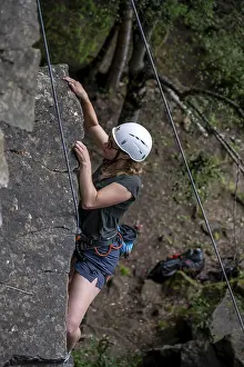 Ketterin rock climbing, woman climbing toprope