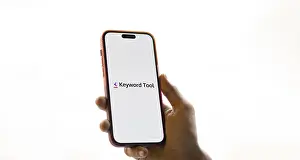 Category Historic EN Prints: keyword tool logo is displayed on smartphone