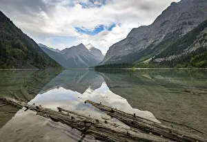 Kinney Lake, snow-capped mountains reflected in the lake