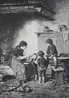 In the kitchen, mother feeding a child while two other children watch