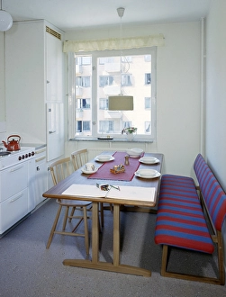 Kitchen in the past. A kitchen with a dining area in the late 1950s