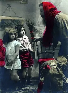Knecht Ruprecht giving children a switch