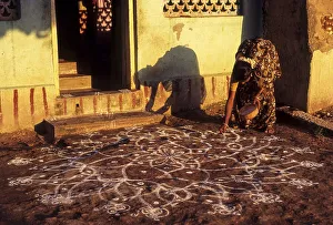 Kolam a decorative drawing of dots and lines