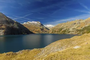 Kolnbrein reservoir on a bright sunny morning