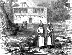 Kurds of the warrior caste in front of a Nestorian dwelling