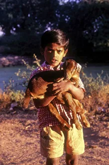 A Lad with her pet goat at Kokrebellur near Mysuru Mysore