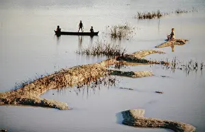 Lake Taungthaman with mud islands and fishermen