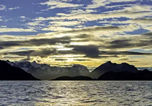Landscape, Atlantic Ocean with mountains and moody cloudy sky at Tromvik