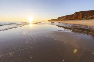 A landscape on the beach at low tide