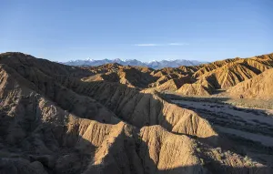 Landscape of eroded hills at sunrise