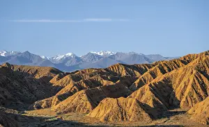 Landscape of eroded hills at sunrise