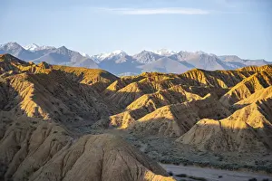Landscape of eroded hills at sunrise