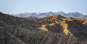 Landscape of eroded hills at sunrise
