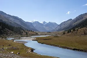 Landscape with high mountains and river in the Tien Shan