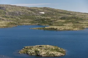 Landscape Russian north view in the tundra with a mountain river and a lake in the mountains without people