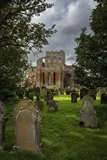Lanercost Priory, ruined church and former monastery with ancient graveyard and weathered headstones