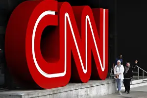 Large red CNN logo on a building