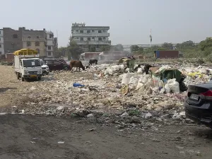 Large-scale waste disposal on a road with vehicles