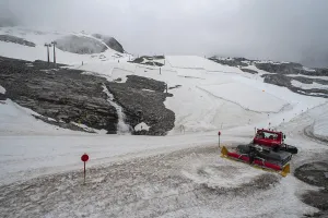 A large snow tarpaulin protecting the ice of the Hintertux glacier in the Alps